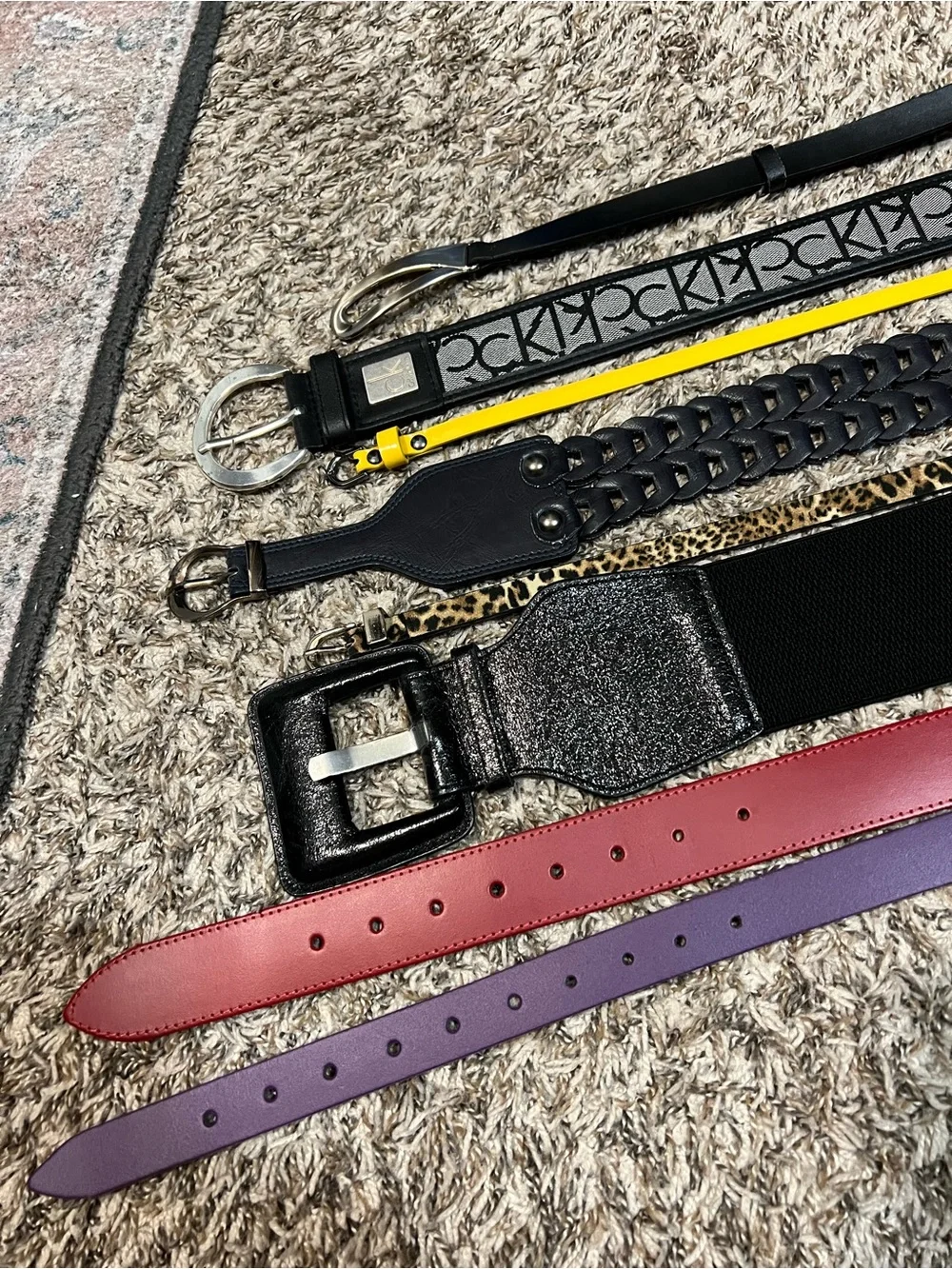 Bundle belt. 3 of them are genuine leather (red, purple and the black)